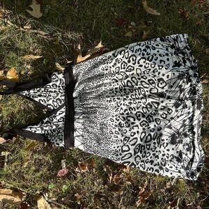 Cute black and white cotton mini dress with cross over chest and funky pattern